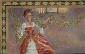 Christmas - Beautiful Woman Hanging Garland c1910 Postcard 