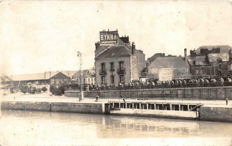 RPPC SHIP DOCK BYRRH ALCOHOL ADVERTISING SIGN REAL PHOTO POSTCARD (c. 1920)