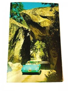 Yosemite National Park Arch Rock Convertible car 1970s postcard California