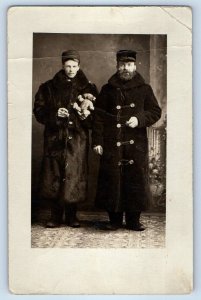 c1910's Men Holding Teddy Bear Fur Coat Studio RPPC Photo Antique Postcard