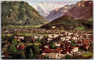 The Village Of Interlachen Switzerland Buildings Houses Mountain Postcard