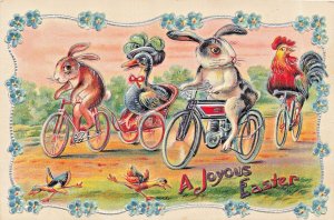 ANTHROPOMORPHIC RABBITS CHICKEN RIDING BICYCLES-MOTORCYCLE- 1911 EASTER POSTCARD