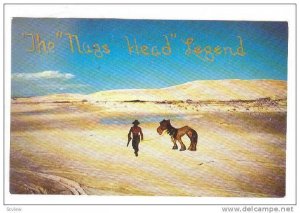 The Nags Head Legend, Man and Donkey crossing desert, North Carolina, 40-60s