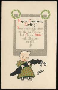 Vintage Gibson Art Co. Christmas postcard. Child with filled stocking. Unposted