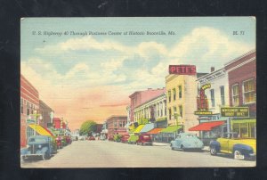 BOONVILLE MISSOURI DOWNTOWN STREET SCENE OLD CARS STORES VINTAGE POSTCARD