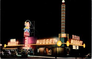 Postcard Neon Lights of Nugget Casino in Carson City, Nevada