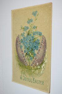 A Joyful Easter Blue Flowers in Easter Egg Postcard B. W. Printed in Germany