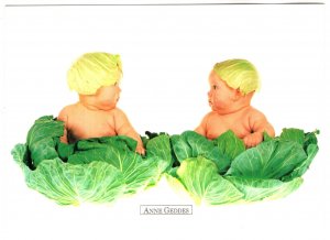 Anne Geddes, Two Babies Sitting in Cabbage Leaves