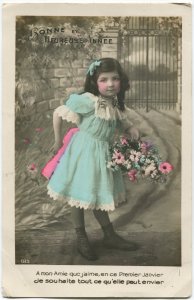 Vintage French, tinted RPPC. Little girl in blue dress. Bonne et heureuse annee