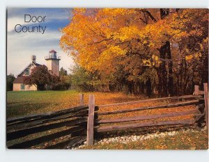 Postcard Autumn color enhances the historic Eagle Bluff Lighthouse, Wisconsin