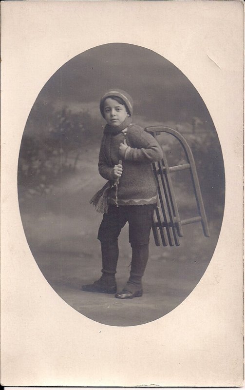 RPPC Little Boy w Sled, Sweater, Cap, Scarf, Winter Scene, Germany?