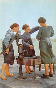 Dutch Girls are enjoying a drink of fresh water Lancaster Pennsylvania, PA