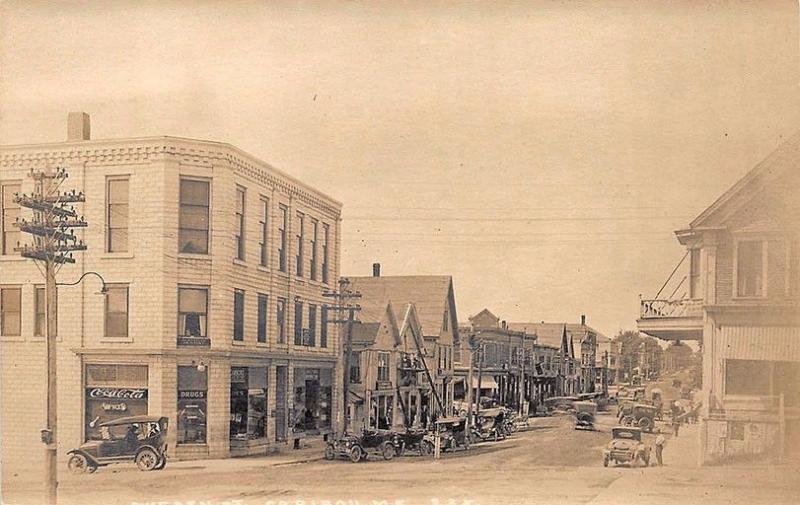 Caribou ME Street View Drug Store Store Fronts Old Cars RPPC Postcard