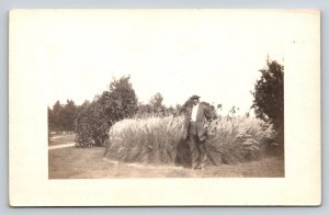 RPPC  Man Posing with Wheat    Postcard