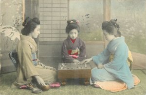 1912 Japan Native women Interior playing game Oriental Store Postcard 26-59