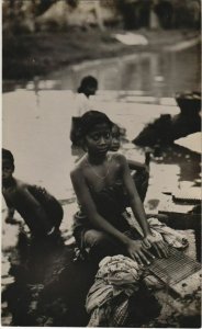 PC ethnic types washing in the river real photo postcard INDONESIA (a18241)