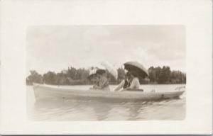 Women in Boat Umbrellas Posted Grand Rapids MI c1911 Real Photo Postcard D73