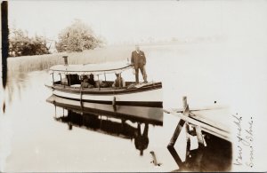 Men in Boat Unknown Location Real Photo Postcard G64