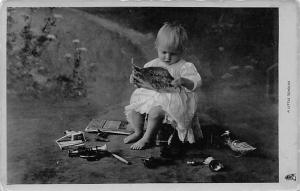 A Little Scholar Child, People Photo Postal Used Unknown 