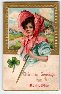 Christmas Postcard Greetings From Rome Ohio Farmer Girl With Rake Shamrock AMP