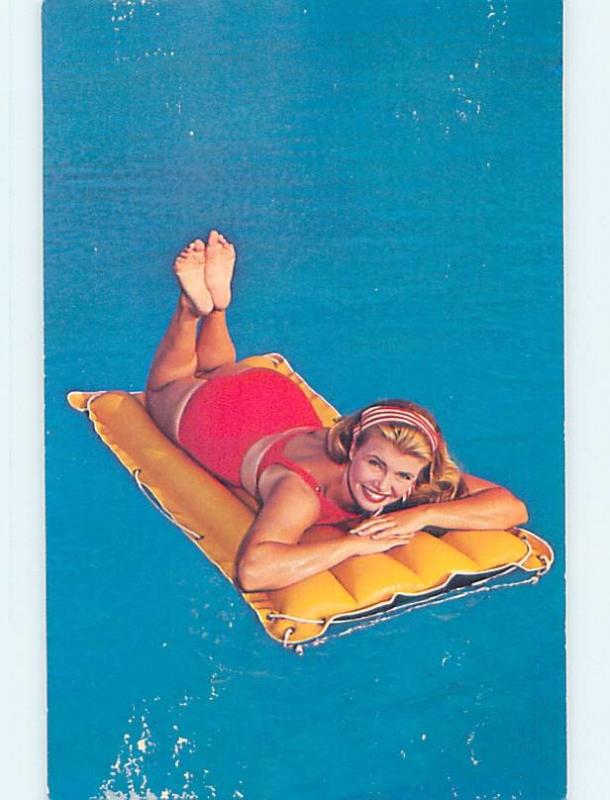 Pre-1980 risque SEXY BATHING SUIT GIRL FLOATING ON VINTAGE AIR MATTRESS HL4135