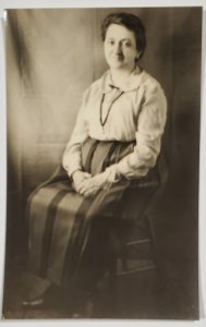 RPPC  Large Woman Striped Skirt Seated for Photo Postcard E30