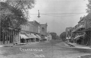 J2/ Constantine Michigan RPPC Postcard c1910 Main Street Stores  197