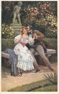 Romantic couple love idyll embrace kiss dress coiffure garden flowers poem