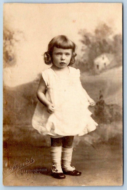 RPPC GIRL IN FRILLY DRESS*IDENTIFIED AS  HARRIET HOGAN*PHYLLIS SAWYER DAUGHTER 