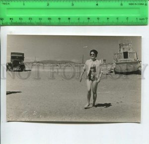 452457 USSR Central Asia woman on the beach truck boat Old photo