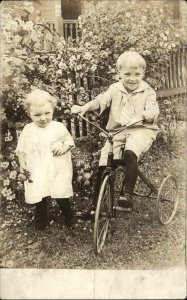 Cute Kids Children Toy Tricycle c1920 Real Photo Postcard