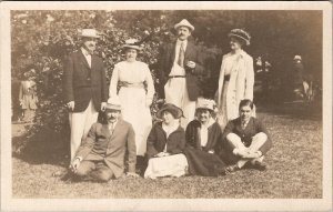 RPPC Lovely Group of Edwardian People Seated in Park Men Women Hats Postcard B21