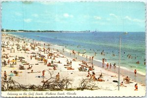 M-89311 Relaxing on the Gulf Beach Madeira Beach Florida USA