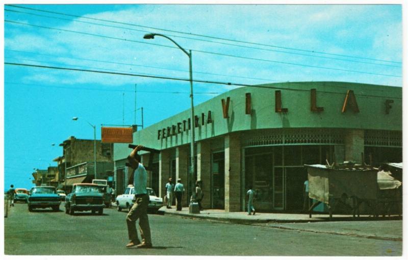 Dominican Republic Duarte Avenue Street Scene Cars and Stores 1960s Postcard