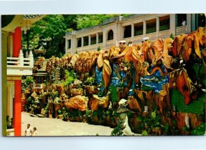 M-87850 Figurines on a artificial grotto Tiger Balm Garden Hong Kong China