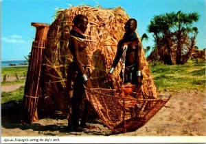 VINTAGE CONTINENTAL SIZE POSTCARD AFRICAN FISHERGIRLS SORTING THE DAY'S CATCH