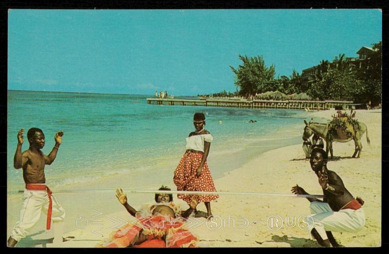 Doing the Limbo on the beach in Jamaica