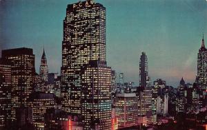 NY, New York City   MID MANHATTAN~Twilight Time   RCA BLDG++    c1960's Postcard