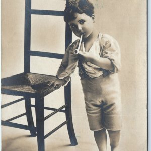 c1900s Little Boy Smoking Pipe RPPC Cute Young Child Weird Tobacco Corn Cob A124