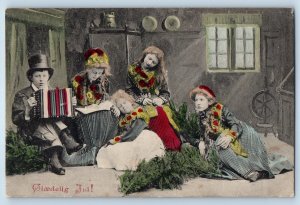 c1910's Christmas Children Boy Playing Accordian Posted Antique Postcard