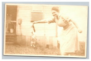 Vintage 1900's RPPC Postcard Women Playing with Kitten Oregon Funny UNPOSTED
