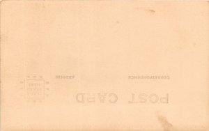 J4/ Bloomington Wisconsin RPPC Postcard c1910 Street Scene Stores Ludden's 109