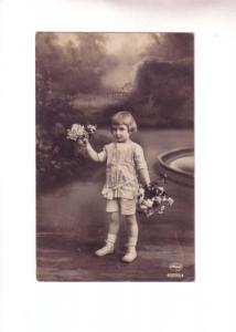 Photo, Small Child with Flowers  Amag Used 1921
