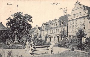 Germany 1906 Zerbst Molkeplatz Children Bench Shop vintage postcard
