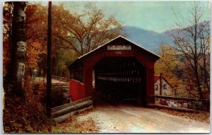 VINTAGE POSTCARD A COVERED BRIDGE IN THE GREEN MOUNTAINS OF VERMONT