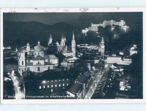 old rppc CITY LIT UP AT NIGHT Salzburg Austria HM1580