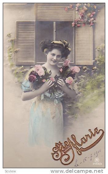RP; Hand-colored, Ste. Marie, Woman carrying pink roses to bosom, PU-1910