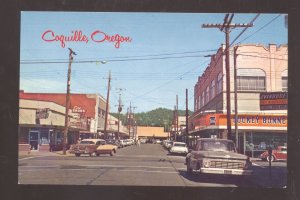 COQUILLE OREGON DOWNTOWN STREET SCENE OLD CARS STORES VINTAGE POSTCARD