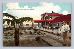 194. KILAUEA VOLCANO HOUSE HAWAIIAN ISLANDS HAWAII MAN LANTERN POSTCARD (c.1910)