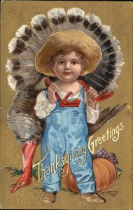 Thanksgiving Cute Little Boy with Dead Turkey c1910 Vintage Postcard